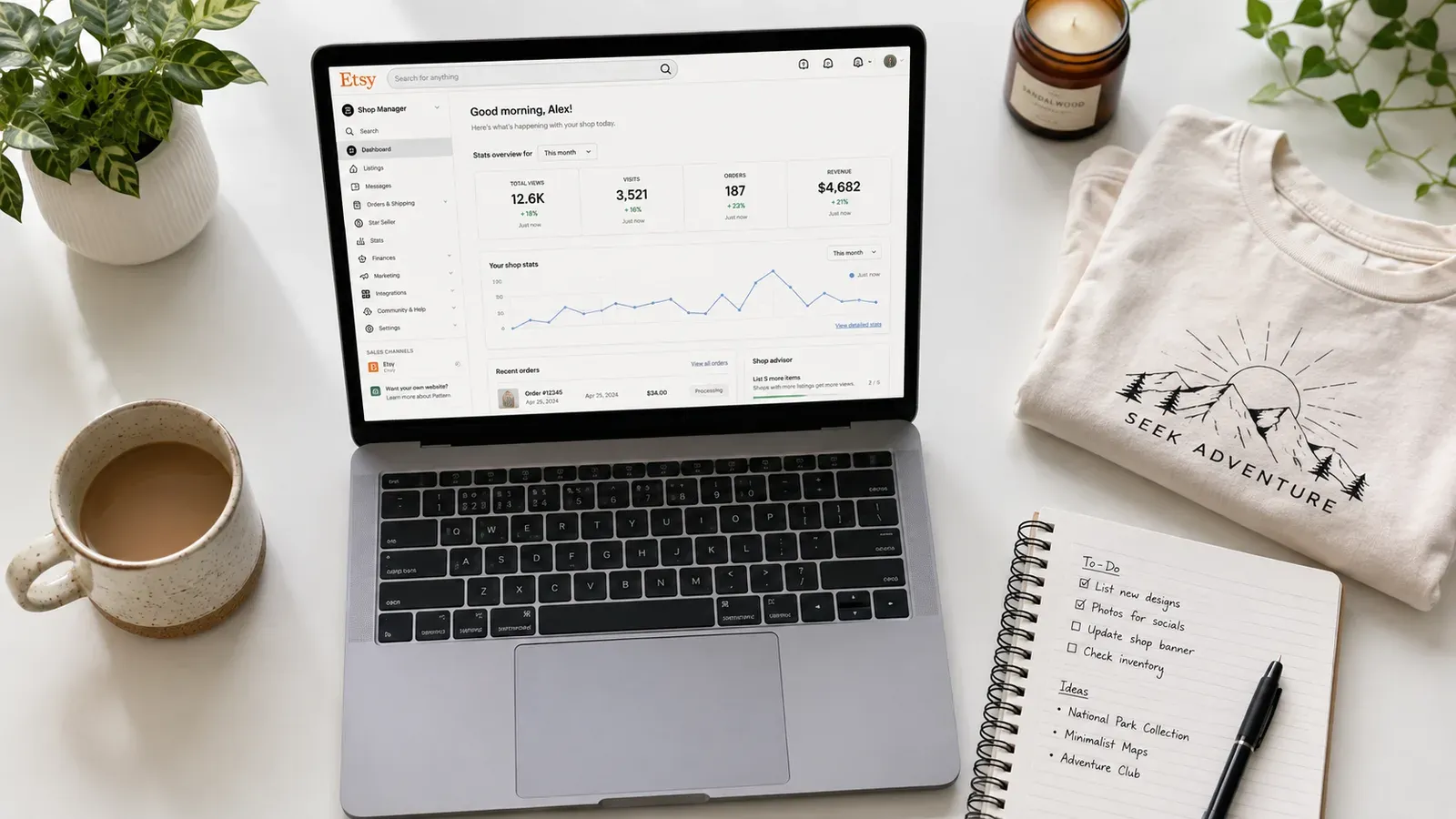 Etsy seller analyzing listing performance on a laptop with product samples on the desk