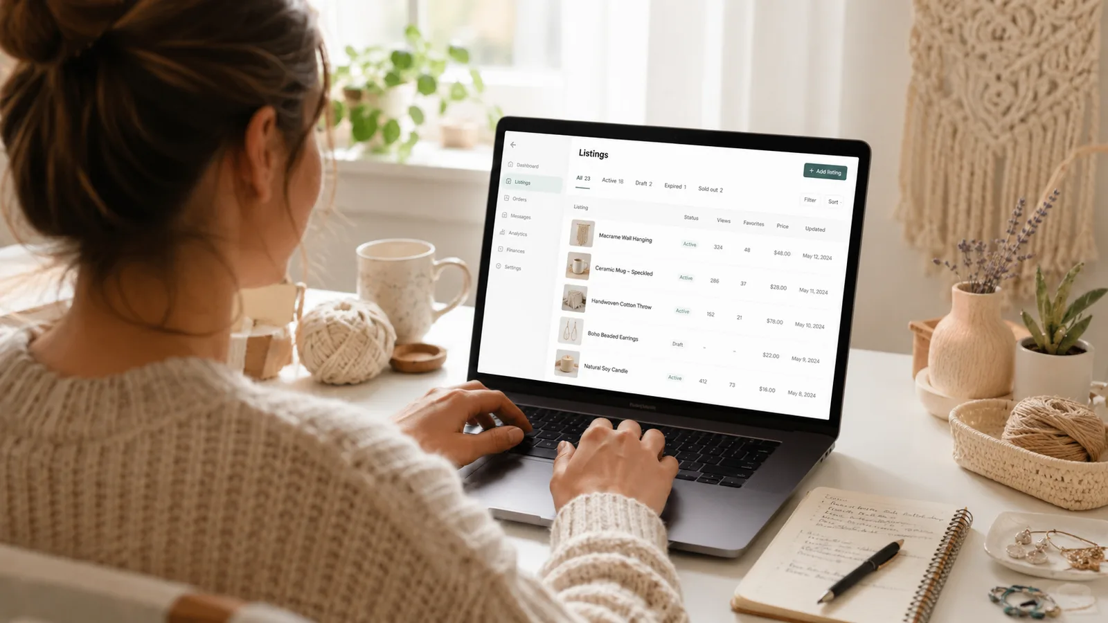 Seller using laptop to manage Etsy shop with Listybox dashboard
